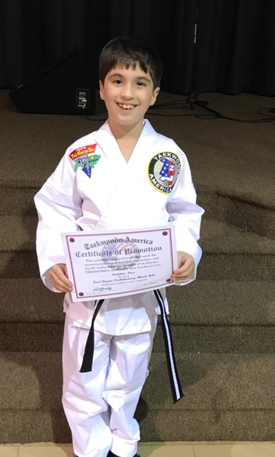 Quest Student receives his next level belt